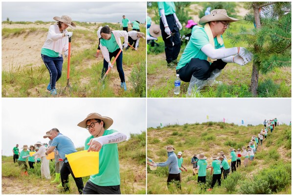 富士膠片沙漠綠化志愿者進(jìn)行栽樹、澆水、剪枝等多項(xiàng)綠化作業(yè)